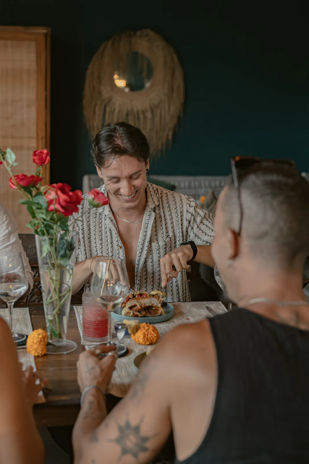 Guests sharing dinner at the villa