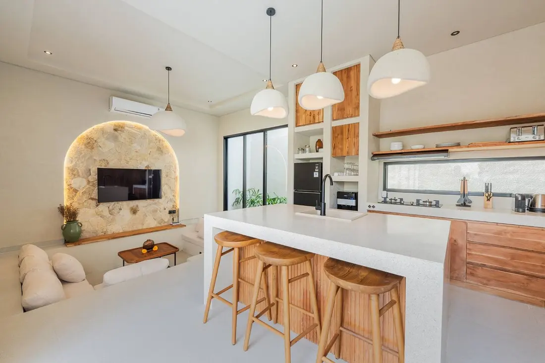 Bright open-plan kitchen and lounge at Villa Sava